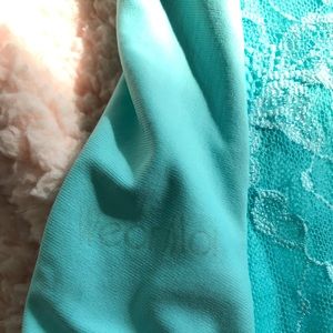 Wear Moi light blue leotard